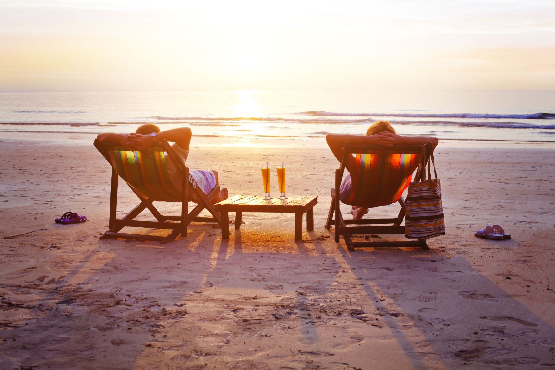 couple sitting on beach resized 2